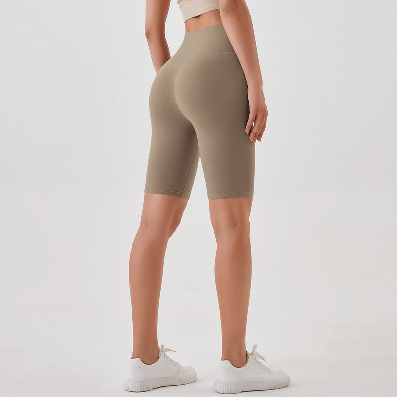 Athletic women's high-waist shorts SF1667 in khaki, perfect for running and yoga, made from comfortable nylon blend, back view.